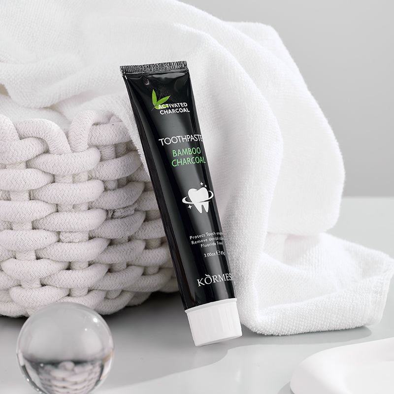 KORMESIC Bamboo Charcoal Toothpaste Fluoride-Free Tooth Care for a Confident Smile Strengthen. Protect. Brighten.