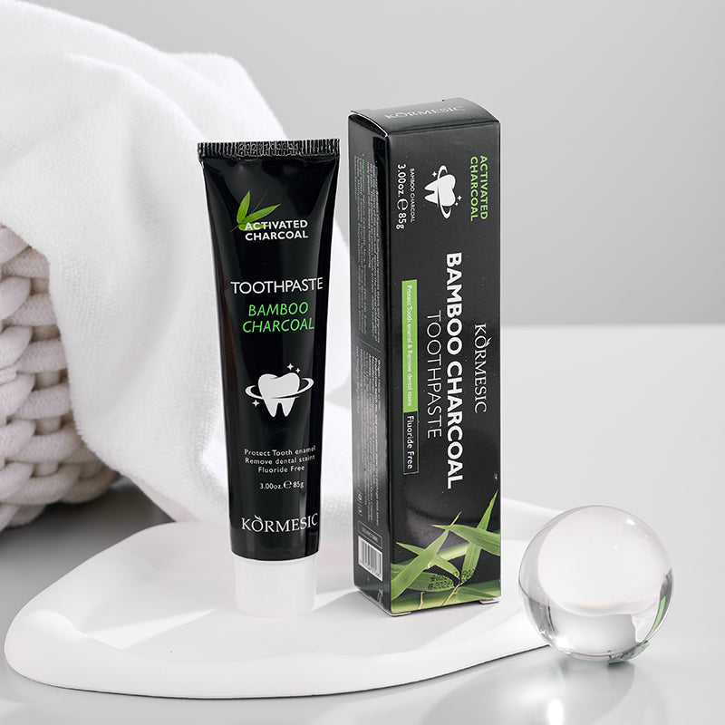 KORMESIC Bamboo Charcoal Toothpaste Fluoride-Free Tooth Care for a Confident Smile Strengthen. Protect. Brighten.